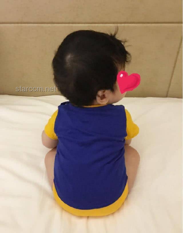 陈妍希晒与儿子洱海背影照：明星亲子互动与社交媒体影响力分析